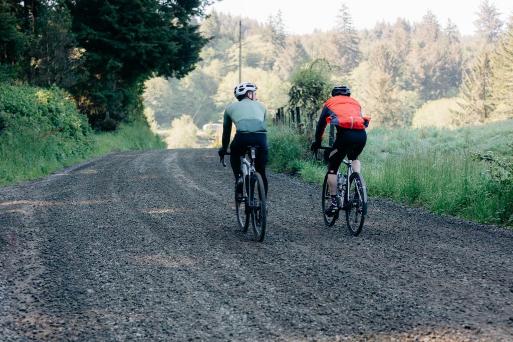 Bicyclists gravel riding on a scenic bikeway